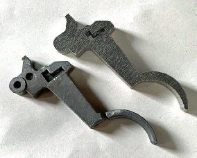A laser cut replacement trigger blank for a Feinwerkbau 127 sport air rifle