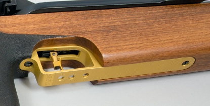 CNC machined aluminium trigger guard fitted to a Feinwerkbau 300s Match air rifle in gold anodised finish